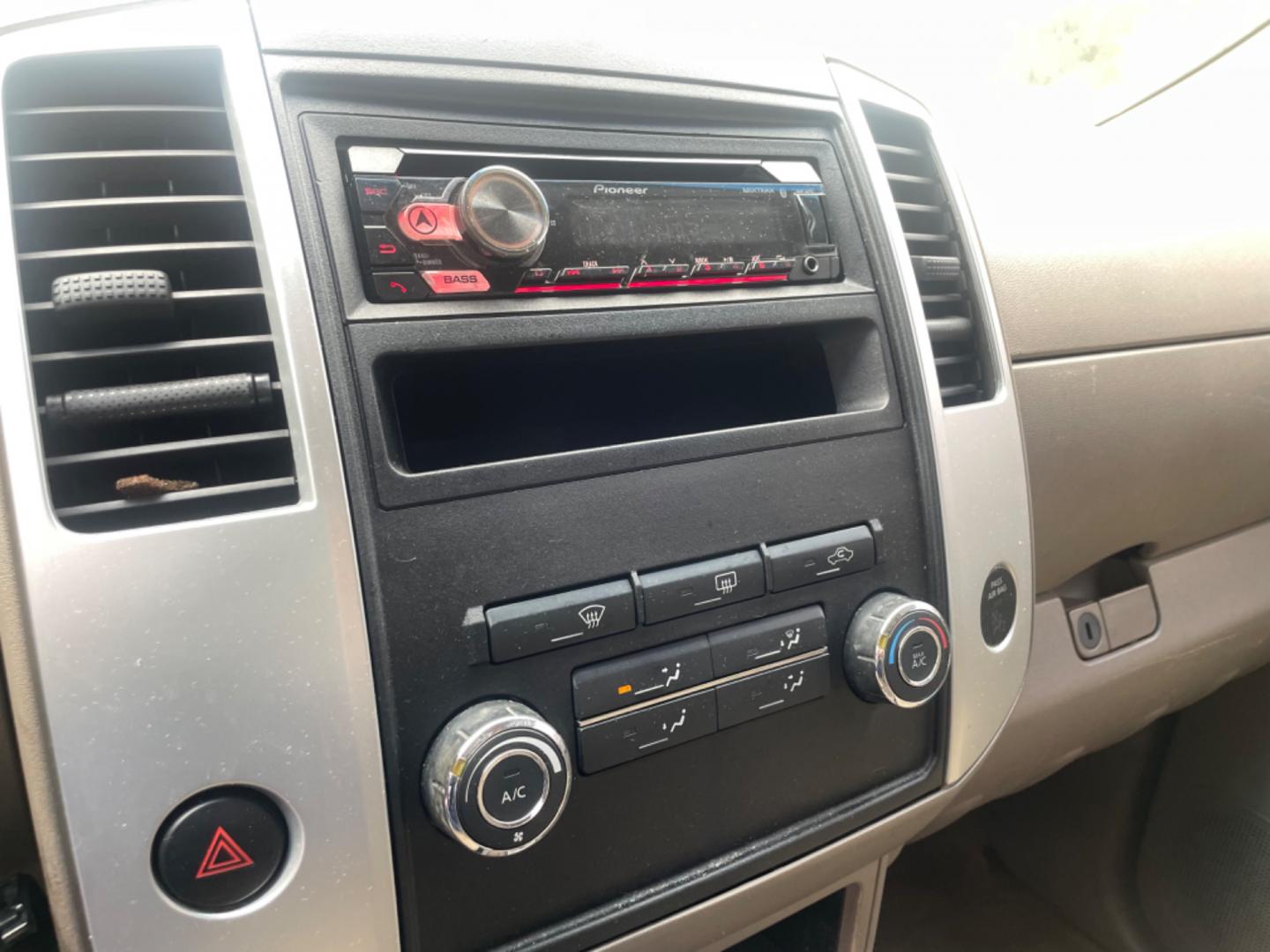 2009 BLACK NISSAN FRONTIER CREW CAB SE (1N6AD07U09C) with an 4.0L engine, Automatic transmission, located at 5103 Dorchester Rd., Charleston, SC, 29418-5607, (843) 767-1122, 36.245171, -115.228050 - Local Trade-in with CD/AUX/Bluetooth, Power Windows, Power Locks, Power Mirrors, Keyless Entry, Alloy Wheels, Bedliner, Tow Package. Clean CarFax (no accidents reported!) 209k miles Located at New Life Auto Sales! 2023 WINNER for Post & Courier's Charleston's Choice Pre-owned Car Dealer AND 2018-2 - Photo#14